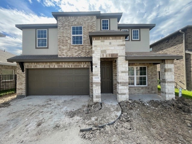 view of front of home with a garage