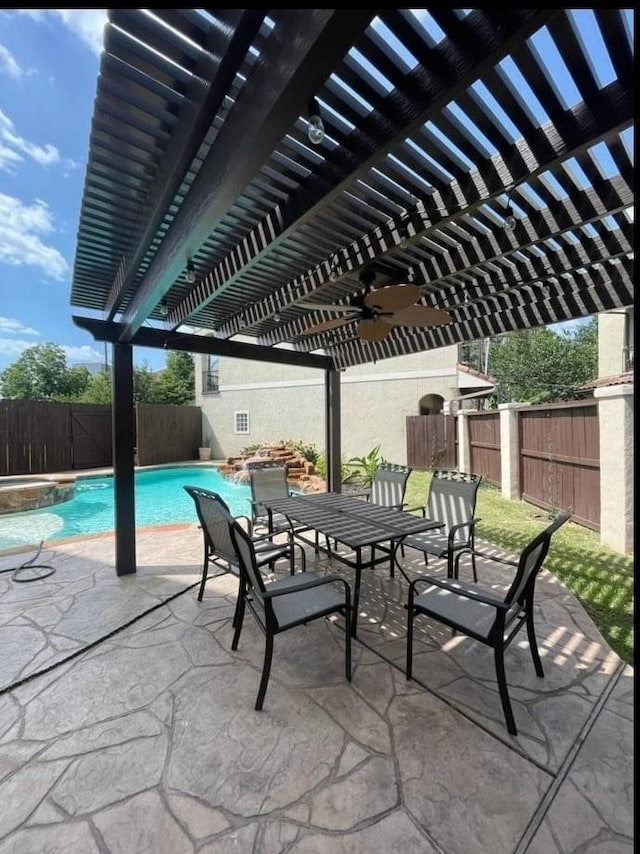 view of patio featuring a pergola and a fenced in pool