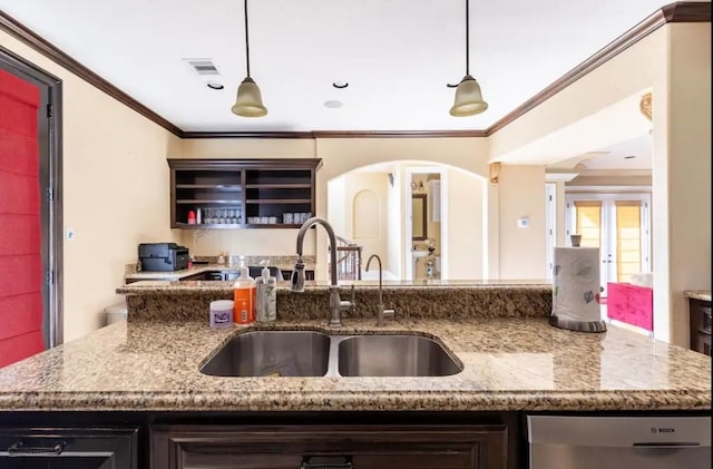 kitchen with dishwasher, light stone countertops, sink, and hanging light fixtures