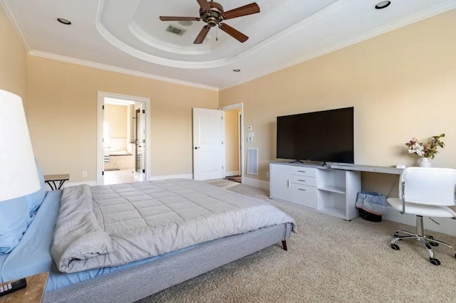 carpeted bedroom with a raised ceiling, ceiling fan, and ornamental molding