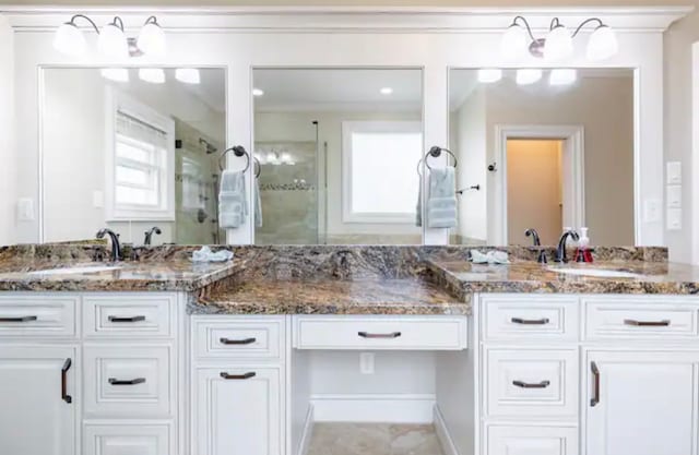 bathroom featuring tile flooring and double sink vanity