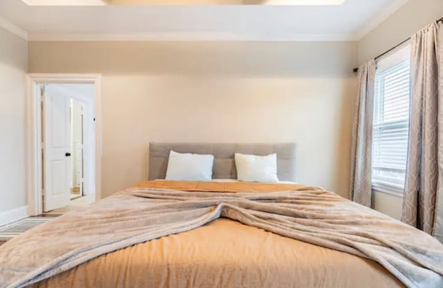 bedroom featuring ornamental molding