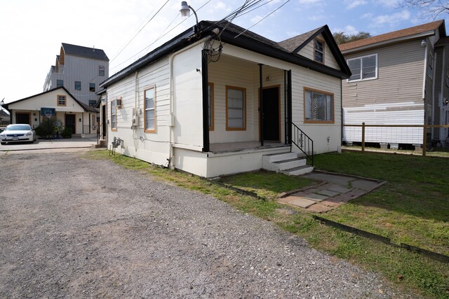 exterior space with a front yard