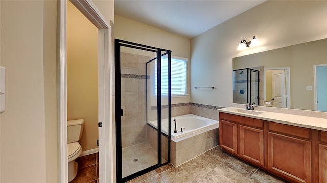 full bathroom with vanity, separate shower and tub, and toilet