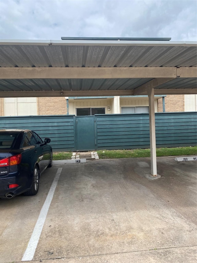 view of car parking featuring a carport