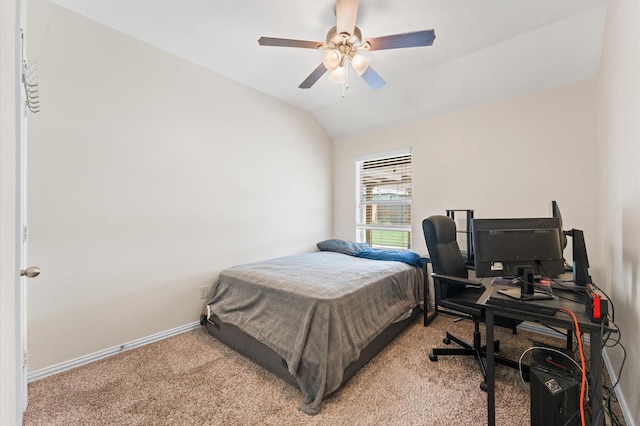 carpeted bedroom with ceiling fan and lofted ceiling