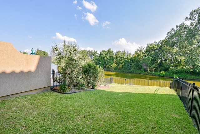 view of yard with a water view