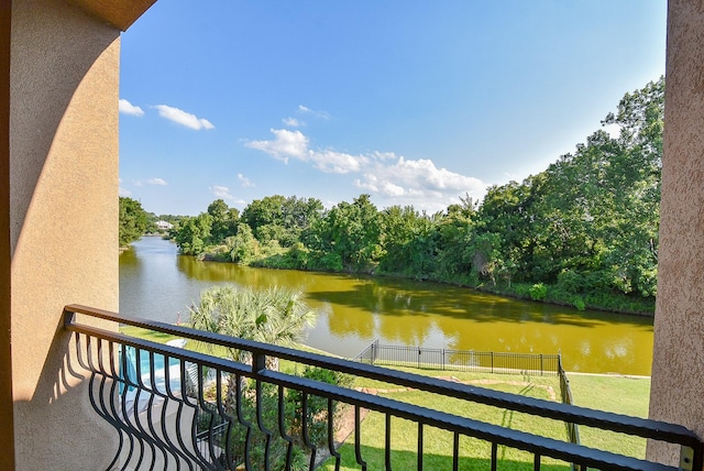 balcony featuring a water view