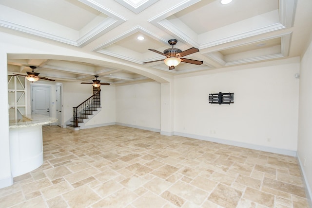 spare room with beamed ceiling, ceiling fan, ornamental molding, and coffered ceiling