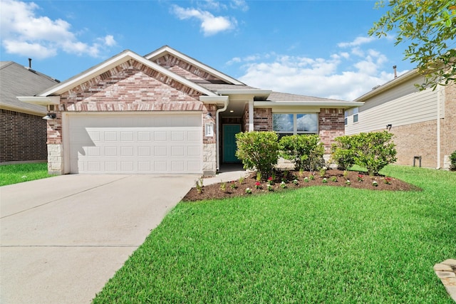 view of front of property featuring a front yard and a garage