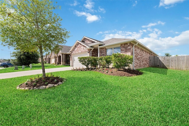 single story home with a garage and a front yard