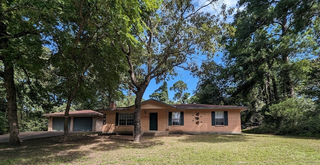 ranch-style house with a front yard