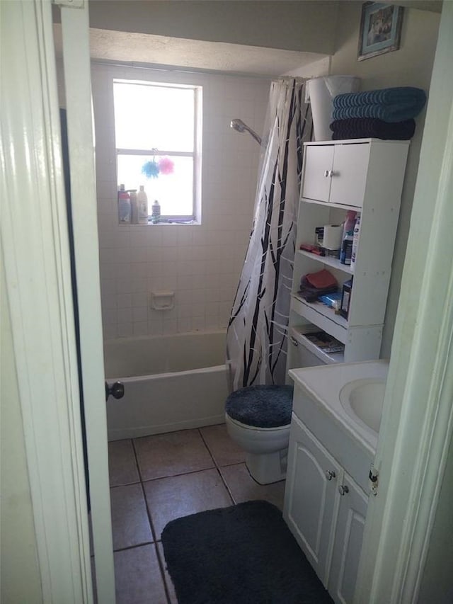 full bathroom with shower / bathtub combination with curtain, tile flooring, toilet, and vanity