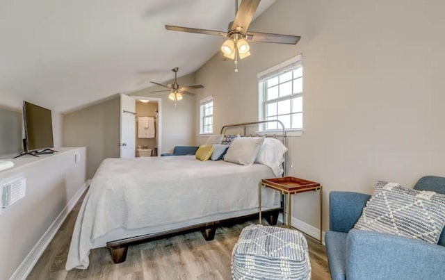 23171 Buena, Galveston, TX 77555 - bedroom featuring ceiling fan, lofted ceiling, and light wood-type flooring