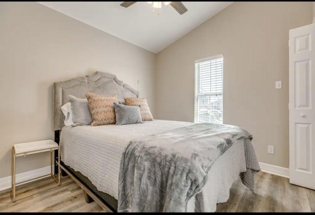 23171 Buena, Galveston, TX 77555 - bedroom with ceiling fan, wood-type flooring, and vaulted ceiling