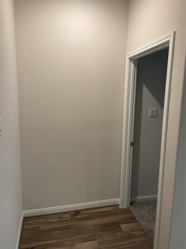 hall featuring dark hardwood / wood-style flooring