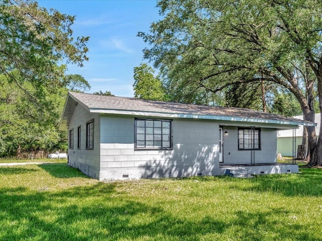 exterior space with a yard