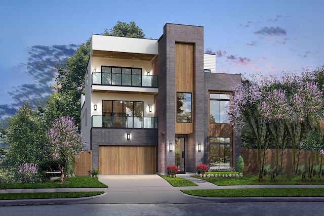 contemporary home with a balcony and a garage