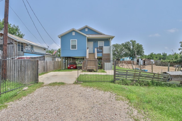 view of front of home featuring a carport