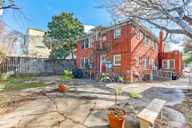 rear view of house featuring a patio area