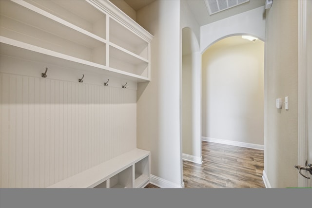 mudroom featuring wood-type flooring