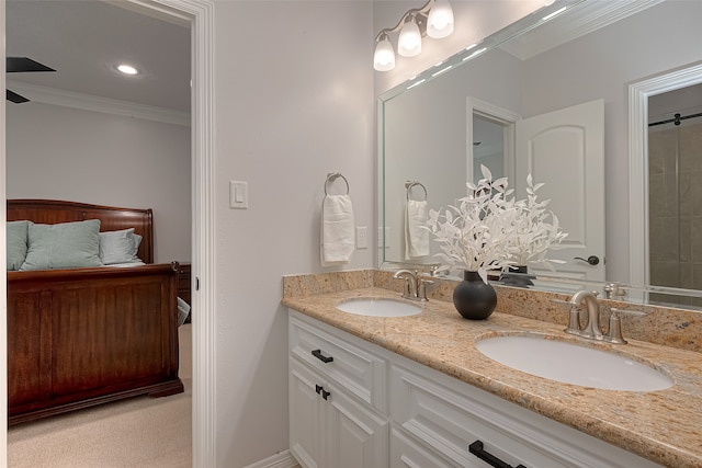 bathroom featuring double vanity and ornamental molding