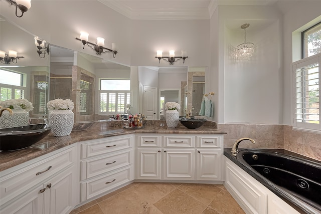 bathroom with crown molding, tile floors, dual bowl vanity, a washtub, and a chandelier