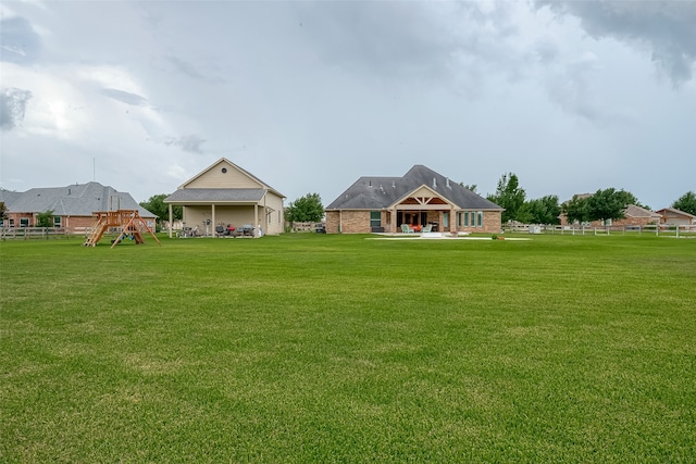 view of yard with a playground