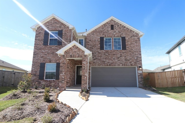 view of front of property with a garage