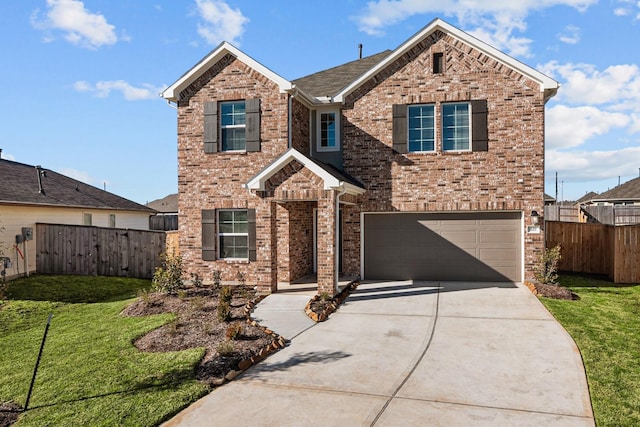 view of front of property with a garage and a front lawn