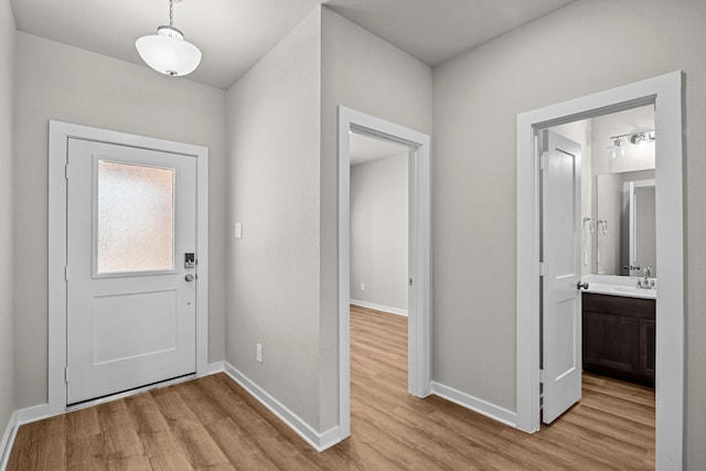 entryway with light wood-type flooring