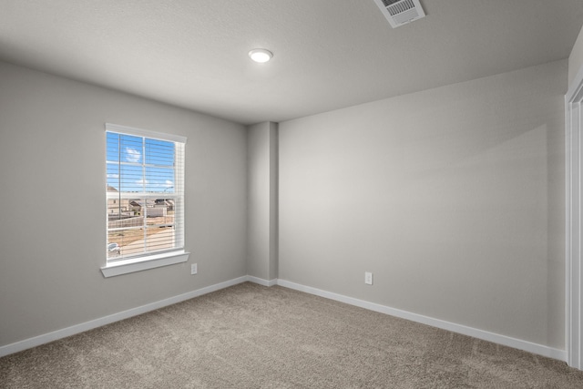 empty room with carpet floors