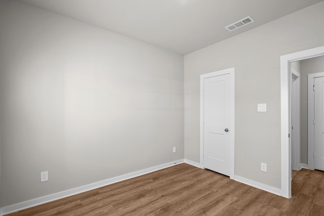 unfurnished bedroom with light hardwood / wood-style flooring