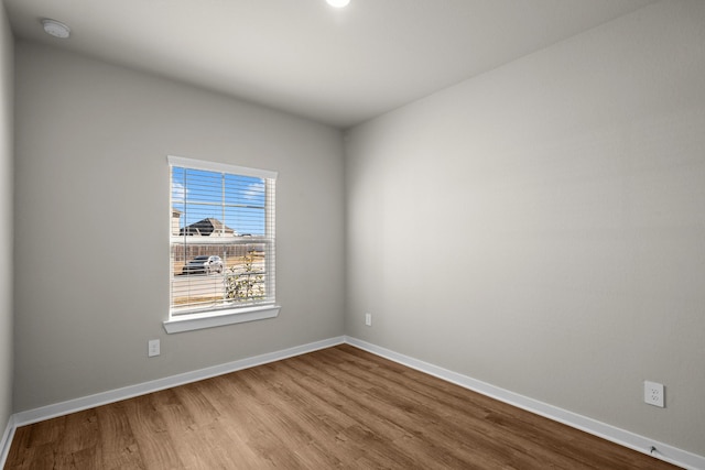 unfurnished room featuring light wood-type flooring