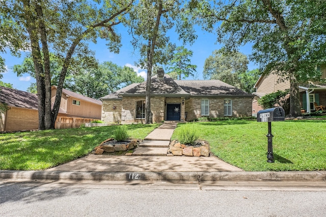 view of front facade with a front lawn