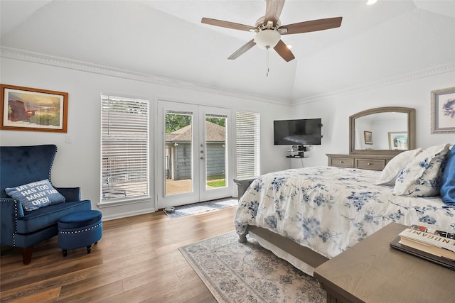 bedroom with lofted ceiling, access to outside, french doors, ceiling fan, and wood-type flooring