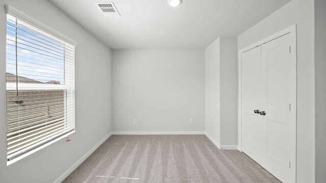 empty room with light carpet