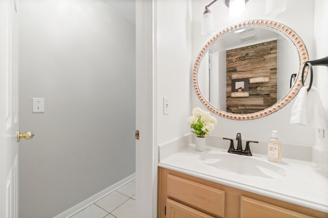 bathroom with vanity with extensive cabinet space and tile floors