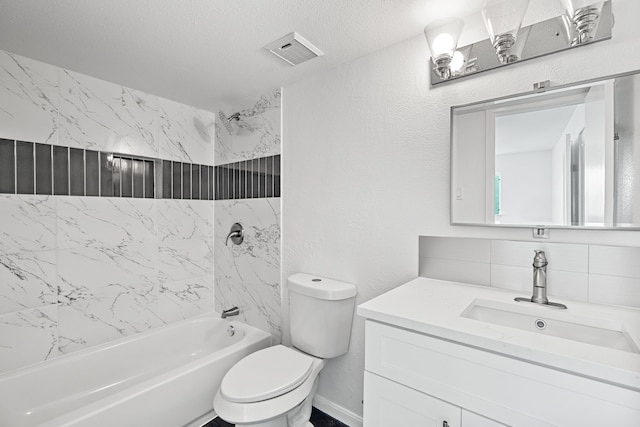 full bathroom featuring tasteful backsplash, vanity, a textured ceiling, tiled shower / bath combo, and toilet