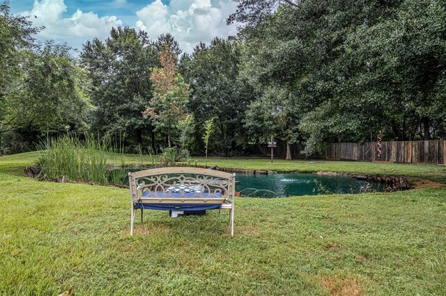 view of yard featuring a water view