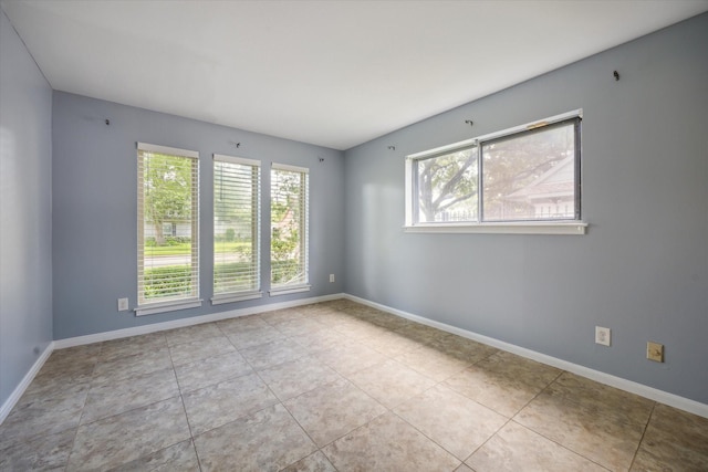 view of tiled spare room