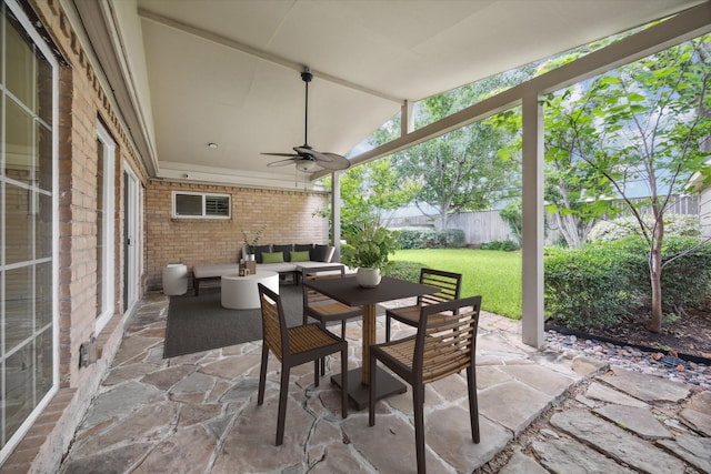 view of patio with ceiling fan and an outdoor hangout area