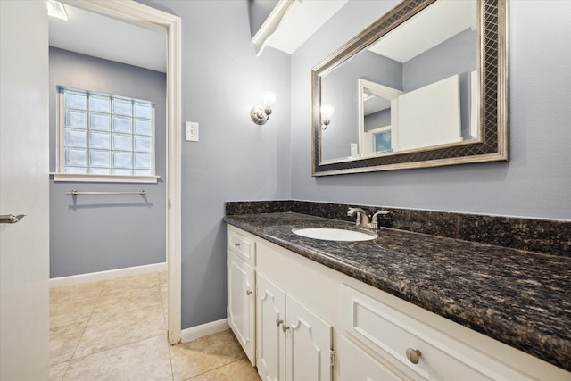 bathroom featuring tile patterned floors and vanity