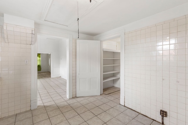 interior space with light tile patterned floors