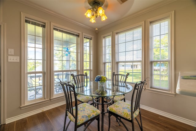 dining area featuring crown molding, ceiling fan, and dark wood-type flooring