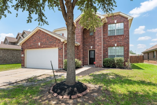 traditional home featuring fence, concrete driveway, a front yard, a garage, and brick siding