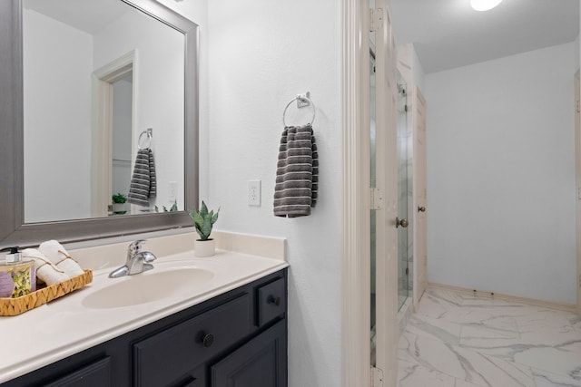 bathroom with vanity and walk in shower