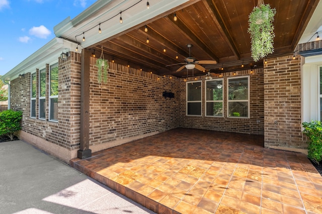 view of patio with ceiling fan