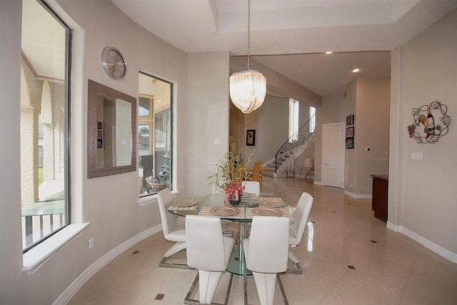 dining area featuring a chandelier