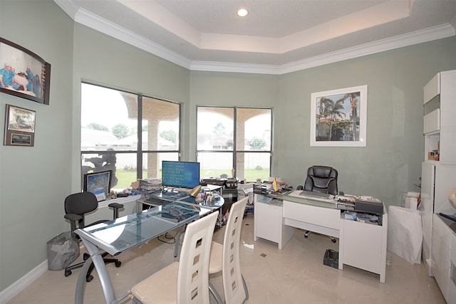 office area featuring crown molding and a raised ceiling